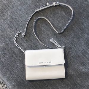 Never worn Michael Kors light grey wallet purse